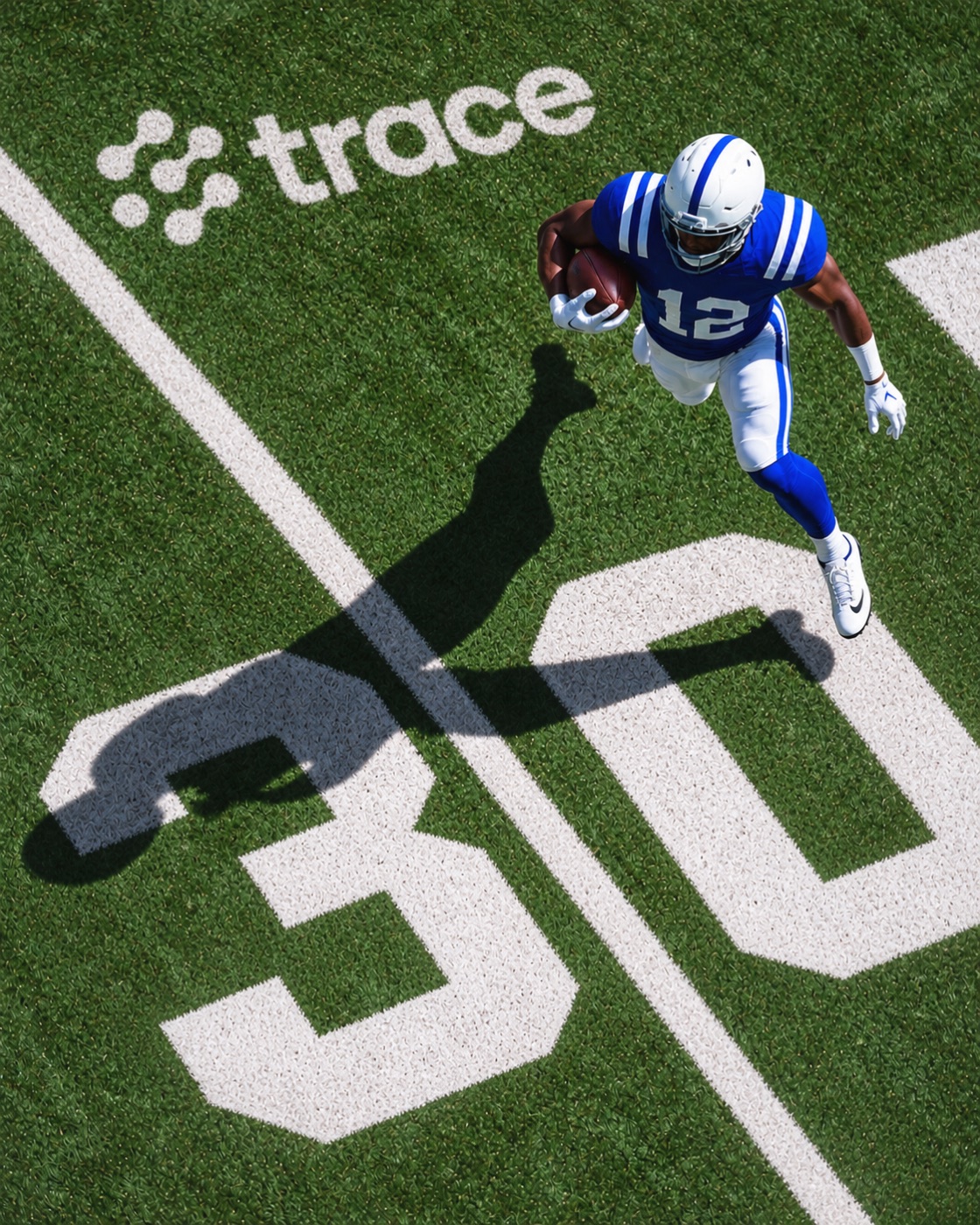 Aerial football field with the Trace logo painted on the turf — original AI-generated artwork